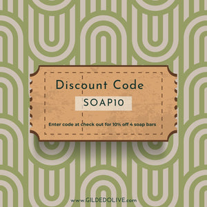 Discount code card for soap bars on a green patterned background