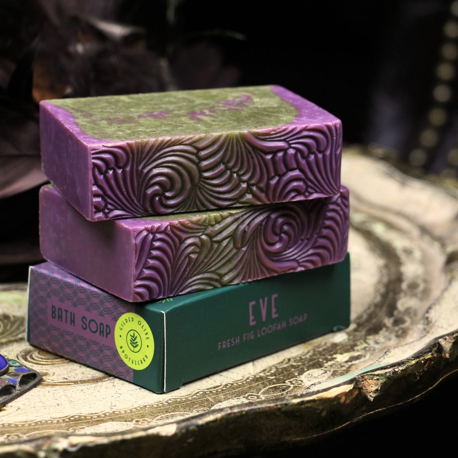 Eve Fresh Fig Loofah Soap Bar stacked on a vintage tray