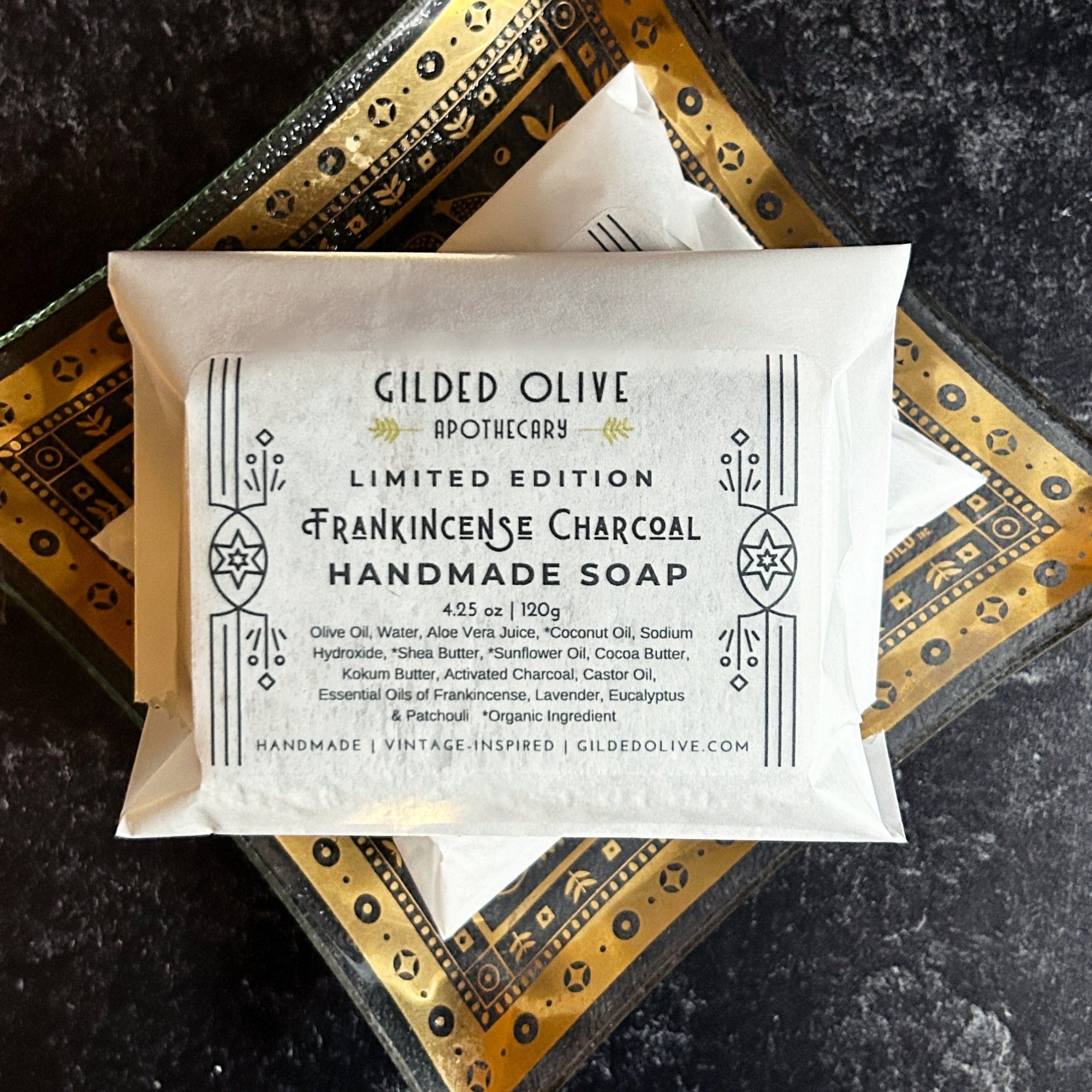 Frankincense Charcoal Handmade Soap on a vintage gold soap dish