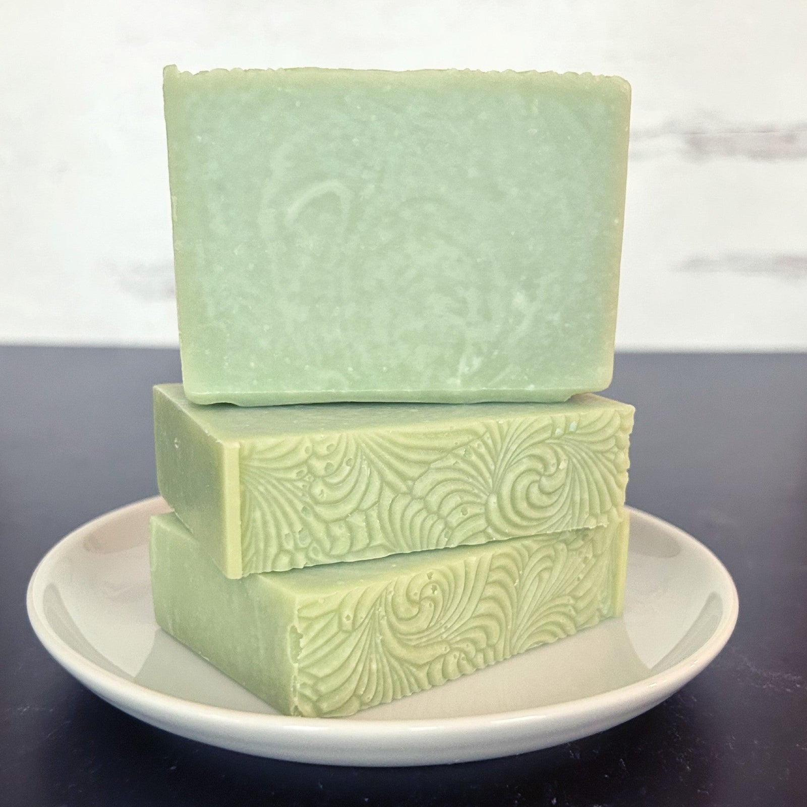 Fresh Pear Handmade Soap, stacked on a white dish