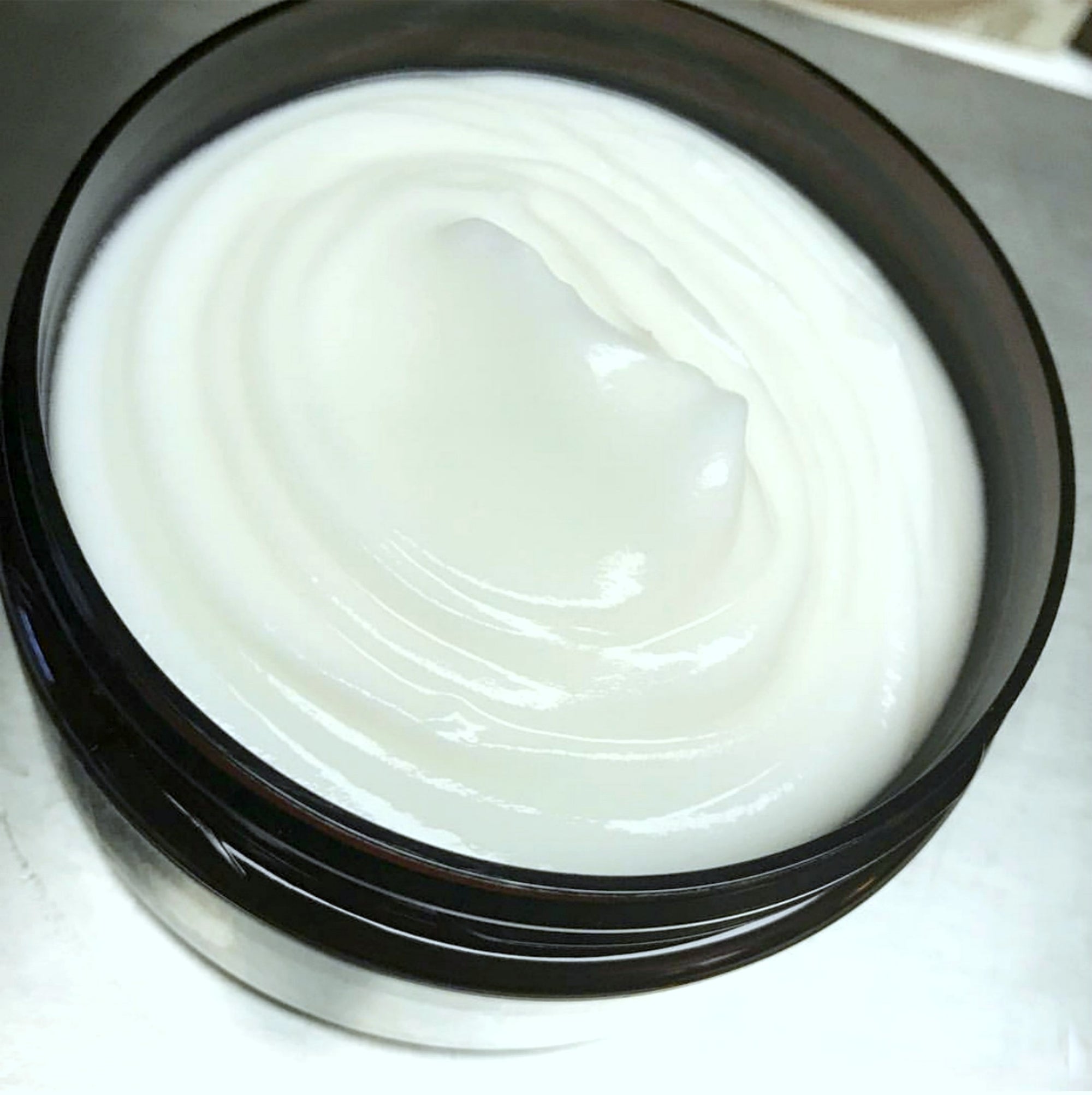 Whipped Body Cream in a dark jar