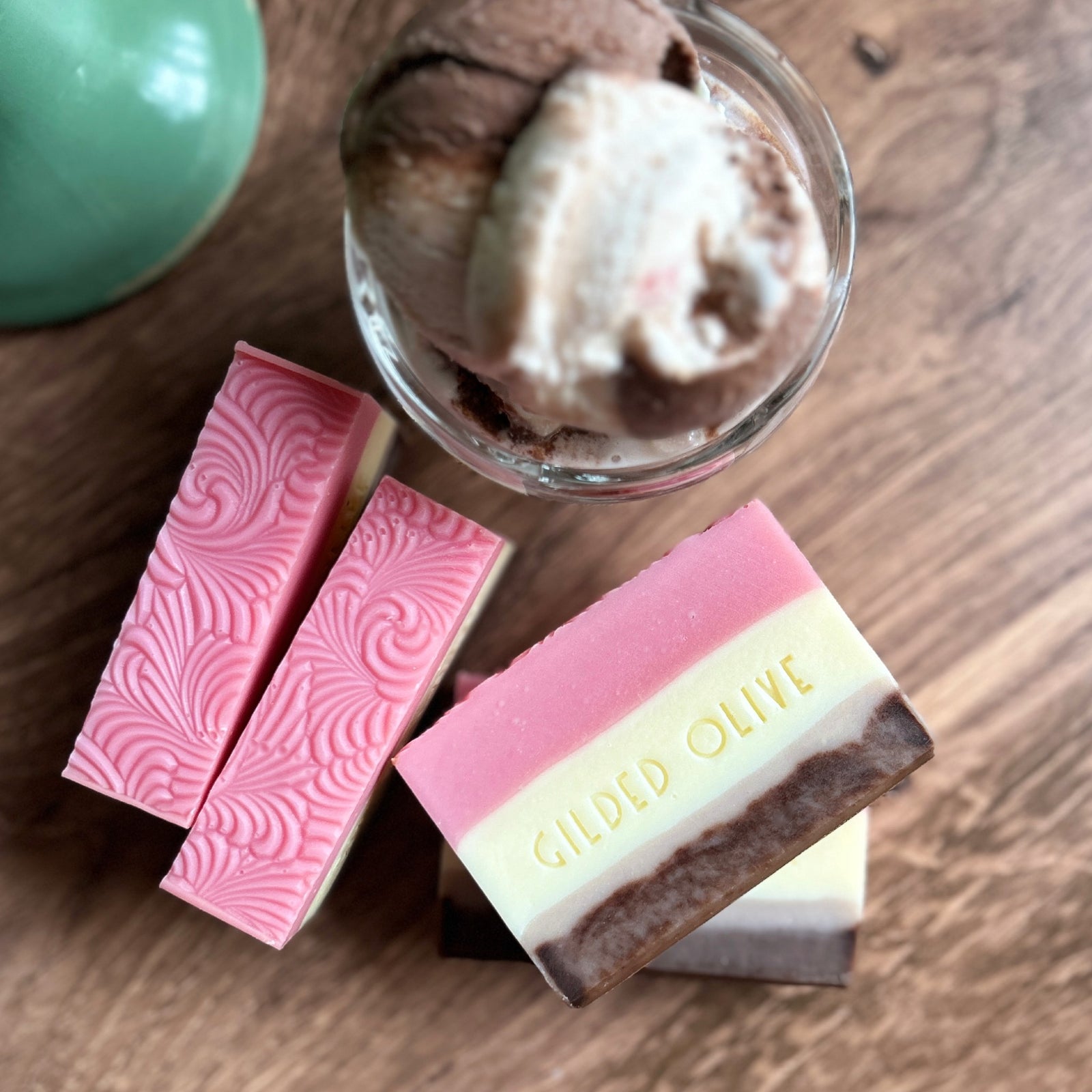 Handmade Neapolitan Ice Cream Soap next to ice cream in an old fashioned glass dish