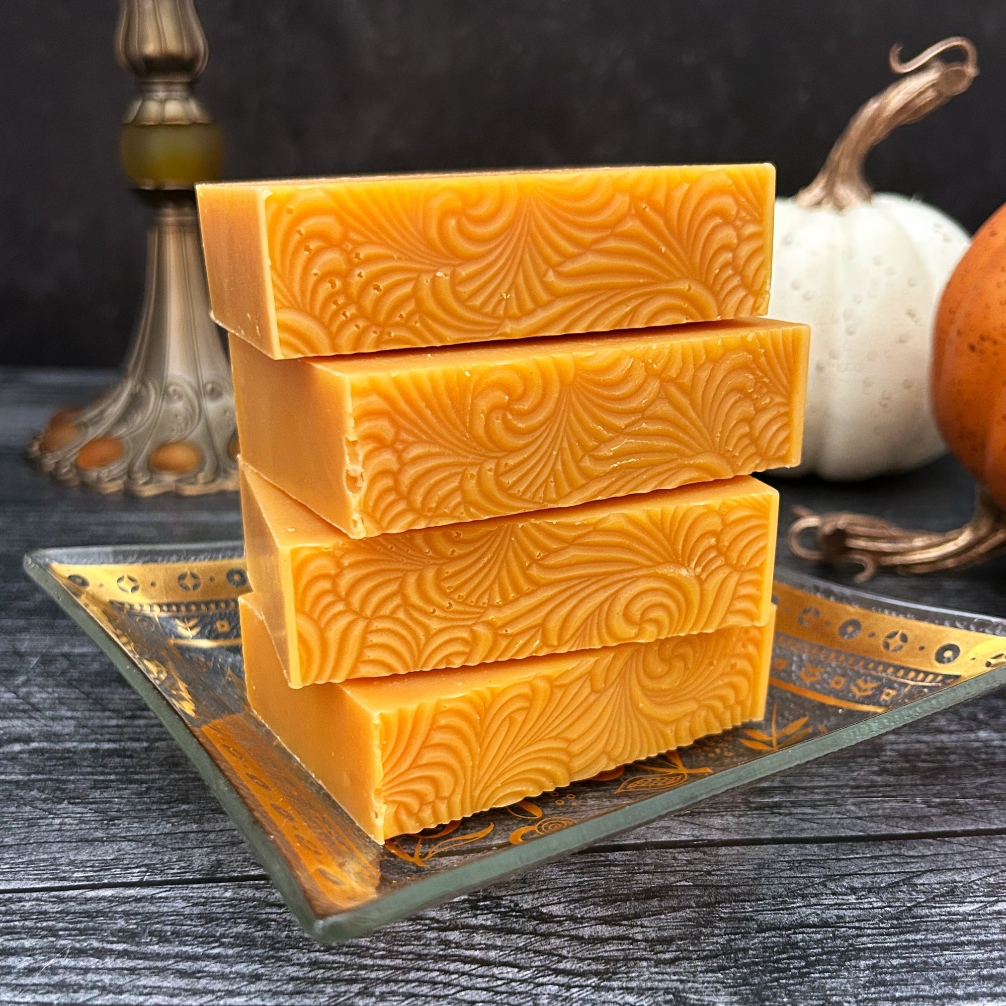 Pumpkin Spice Handmade Soap, stacked on an old gold dish.