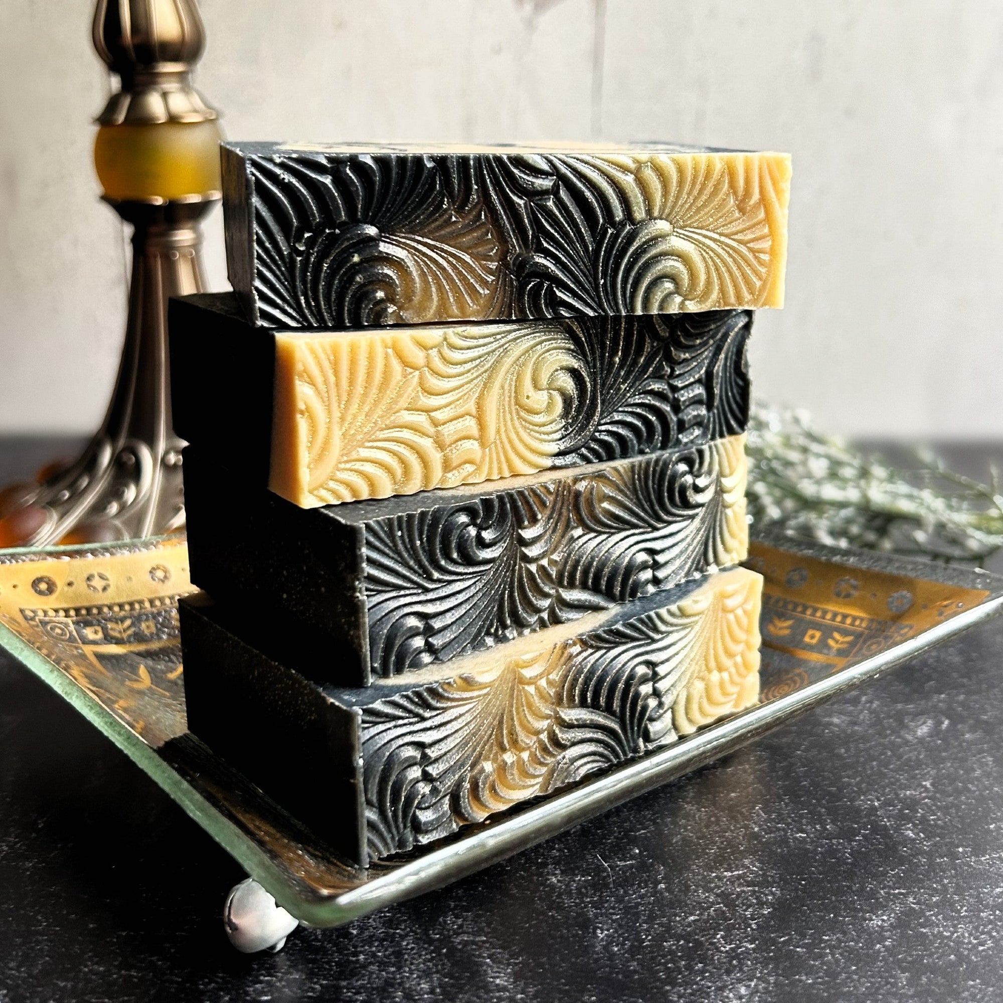 Sacred Embers Handmade Soap, stacked on a vintage, gold dish