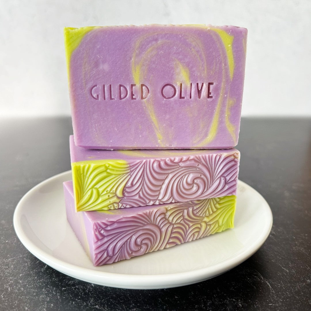 Spring Lilac Handmade Soap, stacked on a white dish