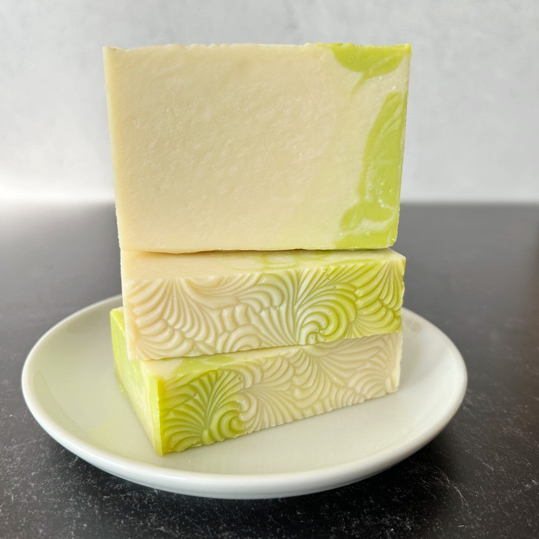 White Gardenia Handmade Soaps, stacked on a white dish